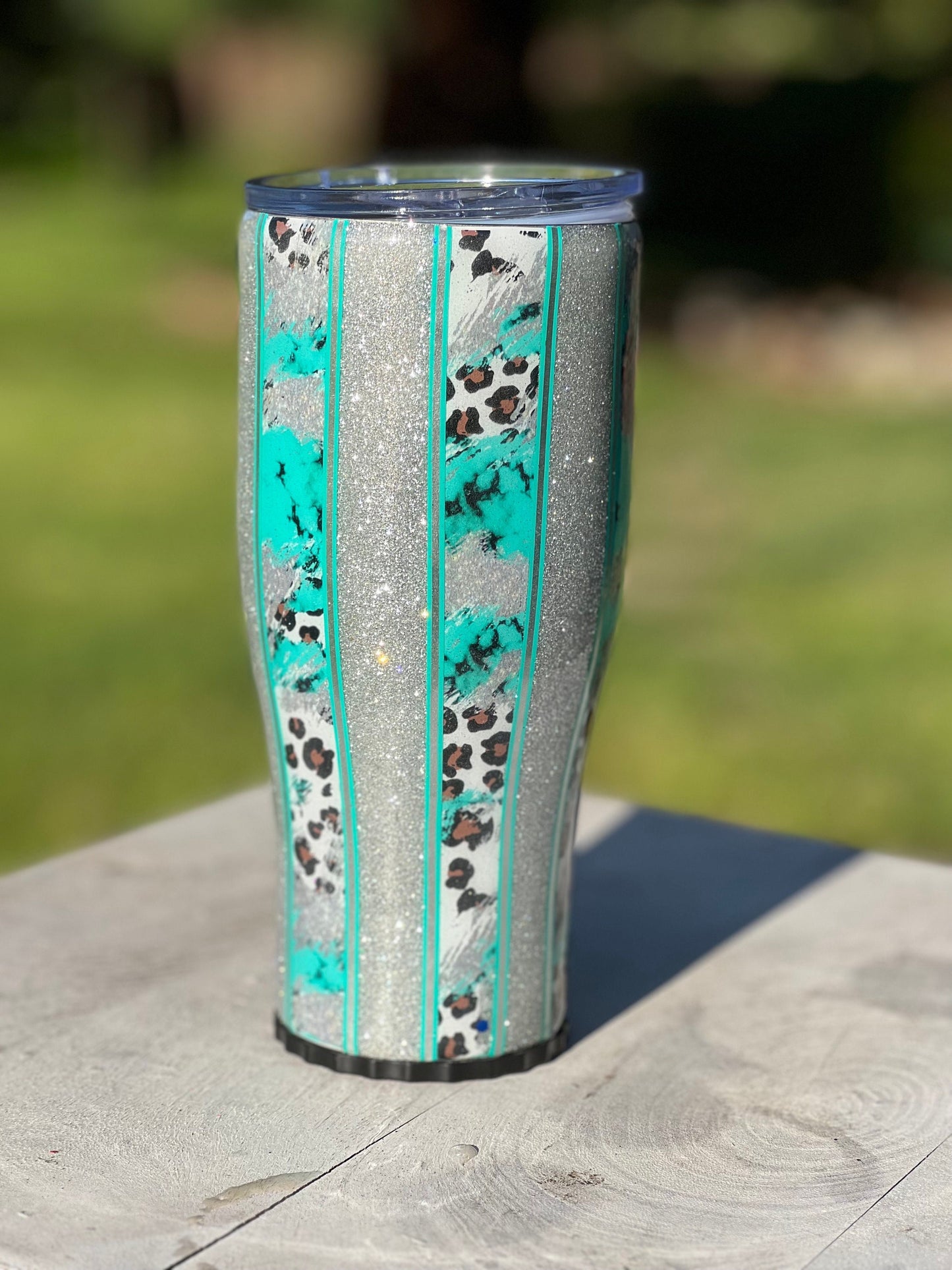 30 oz stainless steel Western Cowprint and turquoise glitter tumbler.