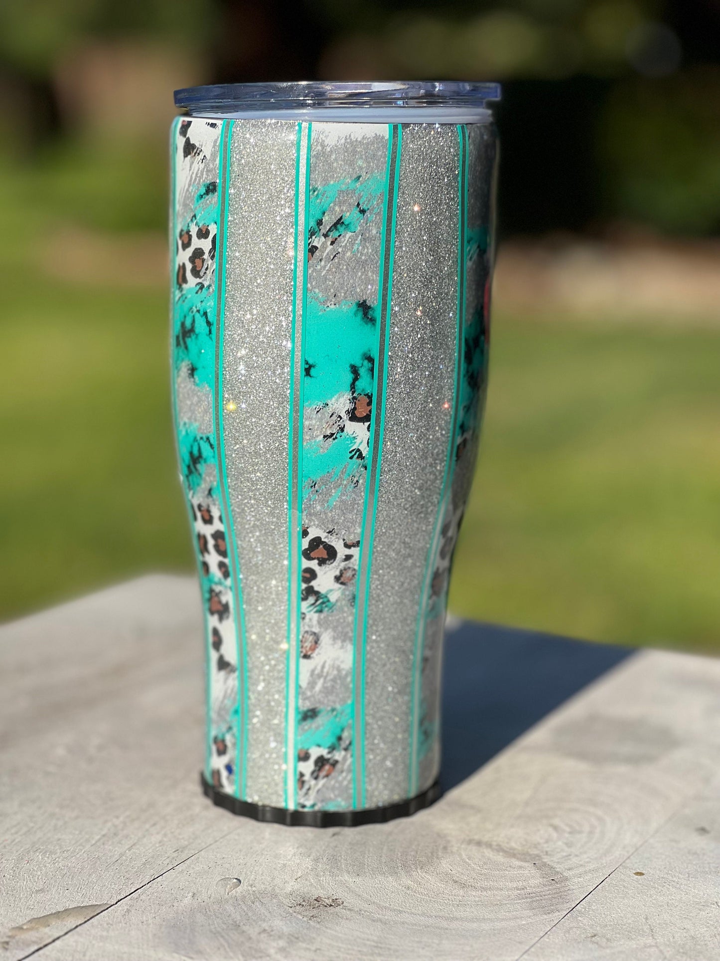 30 oz stainless steel Western Cowprint and turquoise glitter tumbler.