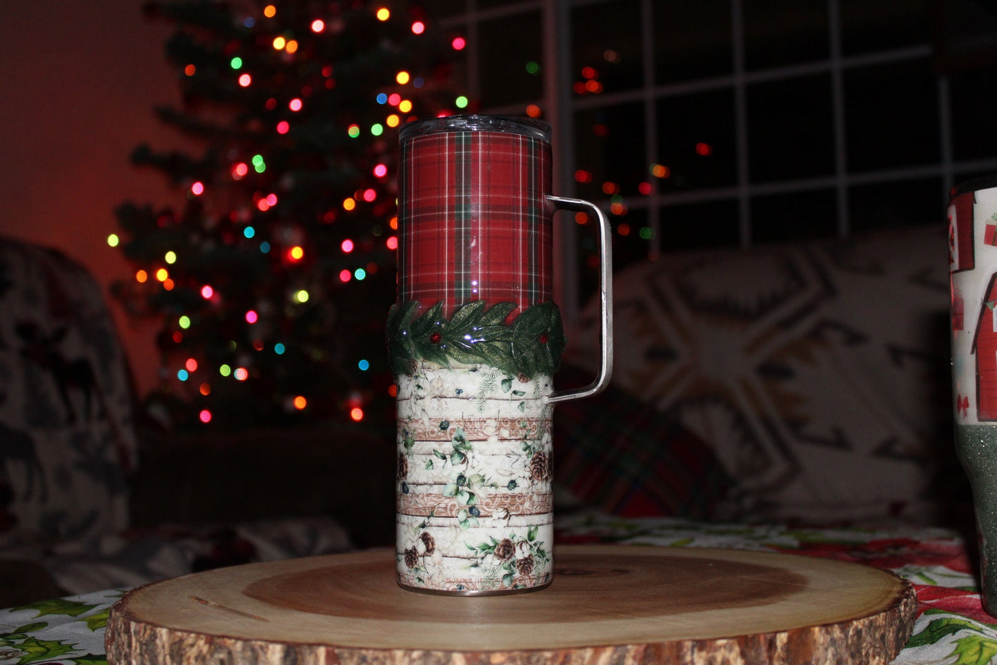 Christmas tumbler with holly accent.  20 oz. stainless steel tumbler with lid and reusable straw.