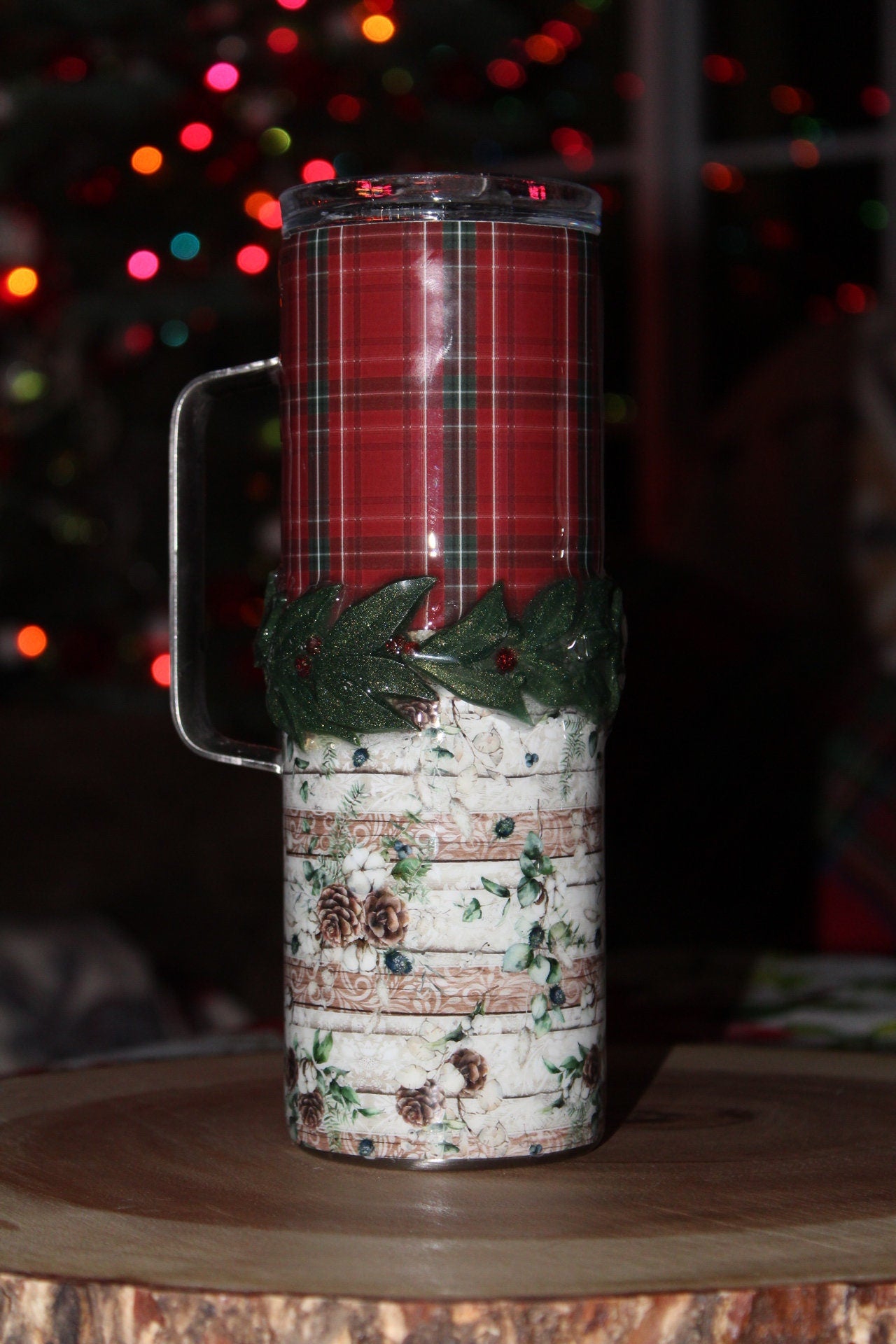 Christmas tumbler with holly accent.  20 oz. stainless steel tumbler with lid and reusable straw.